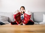 christmas wallpaper, feet, socks, living room, person, relaxing, table, couch, woman, lazy, pajamas, xmas, reindeer, relax, warm, home, sitting, female, human, comfortable, relaxation, cozy